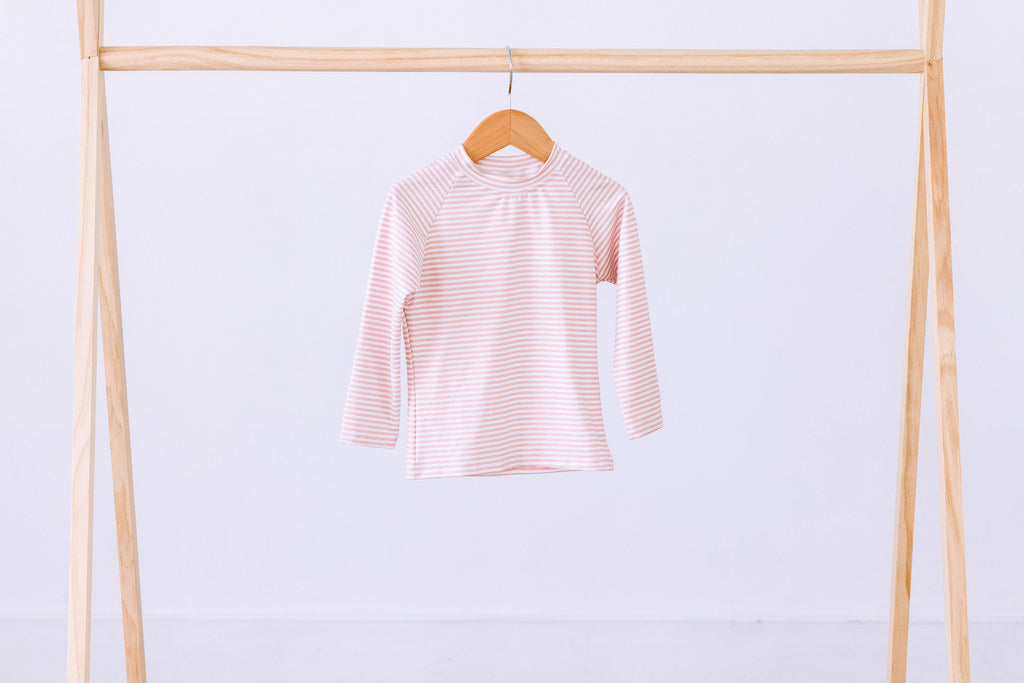 le rashguard du coucher du soleil